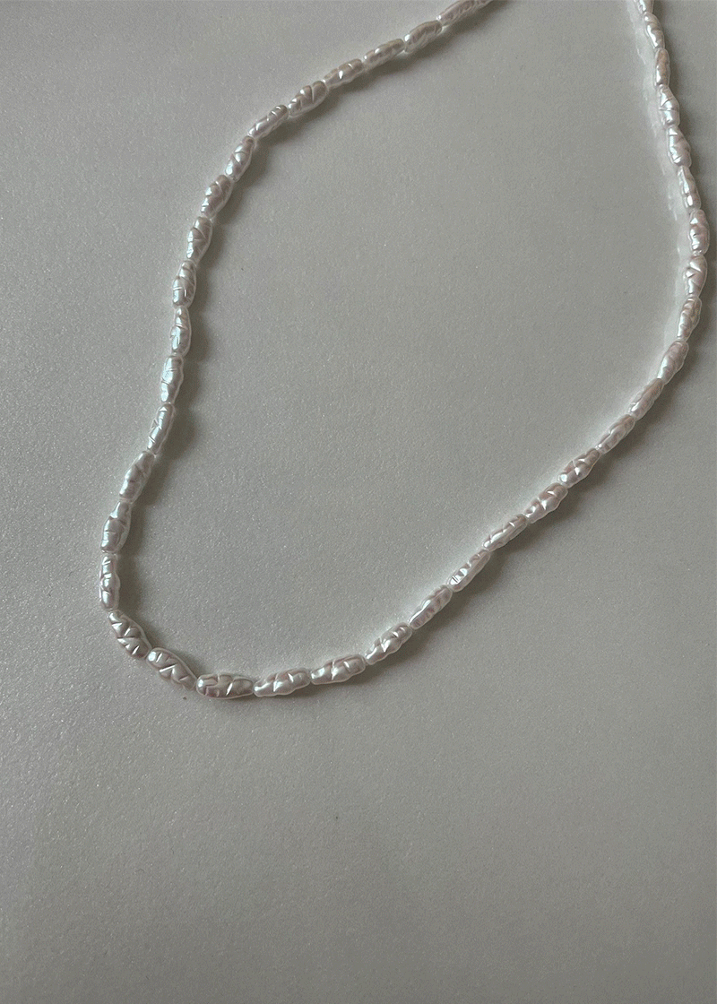 longish uneven pearl necklace
